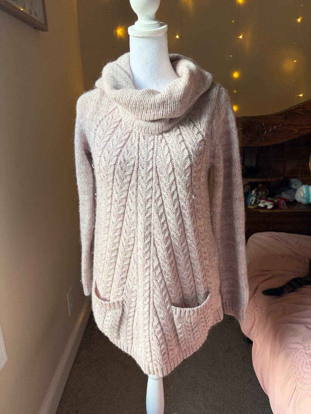 This beautiful dusty rose pink tunic sweater from Anthropologie’s Guinevere